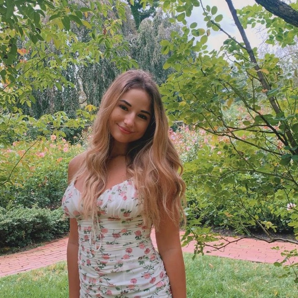 Spring floral mini dress with ruched sides